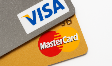 Visa, Mastercard cite travel slowdown impact